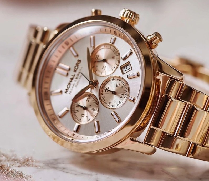Minimalist Michael Kors Pyper MK4340 rose gold mesh watch with crystal accents,